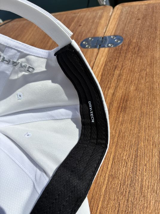 Bundle Cap Kiel weiß und Poloshirt Grömitz für die Skipperin